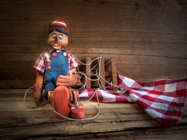 Traditional puppets made of wood.     clipart