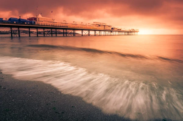 Paignton Pier bij zonsondergang — Stockfoto