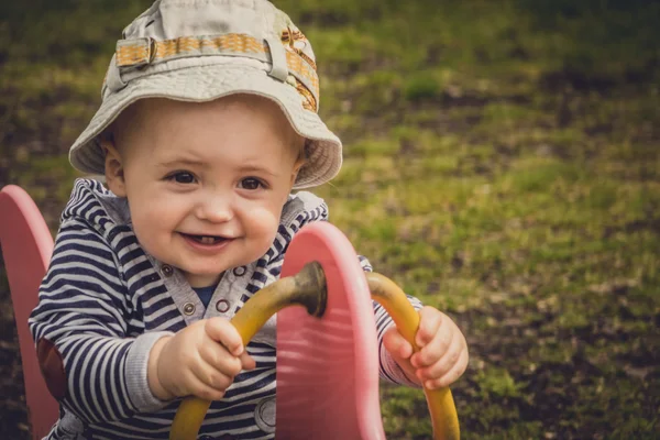 Boy on a swing — Stock Photo, Image