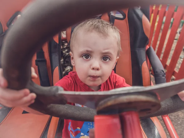 Little boy behind the wheel — Stock Photo, Image