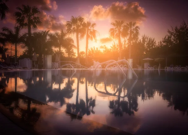 Swimming pool at dusk — Stock Photo, Image