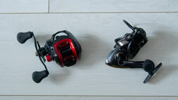 Fishing tackle baitcasting and non-inertia reel Stock Photo