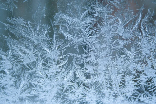 Modello di cristalli di ghiaccio sulla finestra Foto Stock Royalty Free