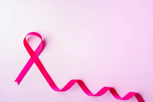 HIV sembolü olarak kırmızı kurdele, AIDS