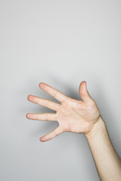 isolated hand gesture in the studio