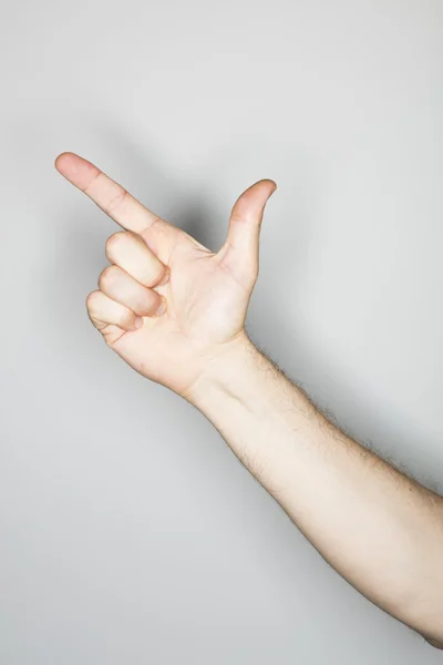 Geïsoleerde handgebaar in de studio — Stockfoto