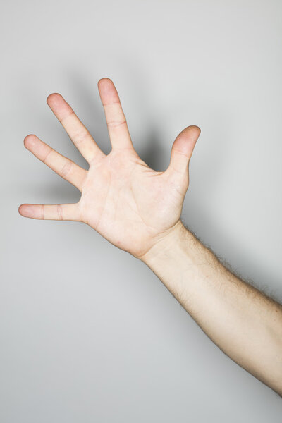 white male person doing an isolated hand gesture 