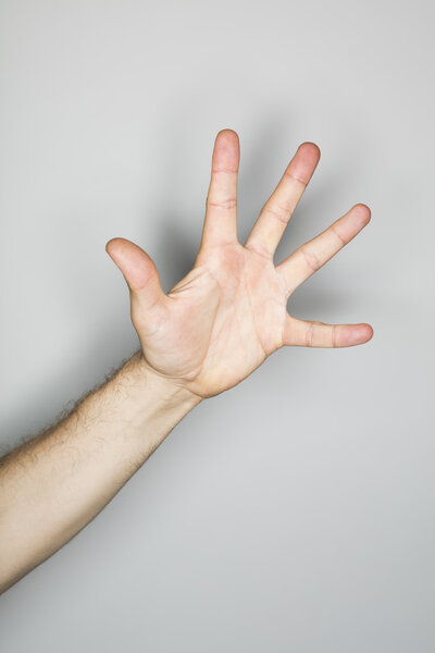 white male person doing an isolated hand gesture 