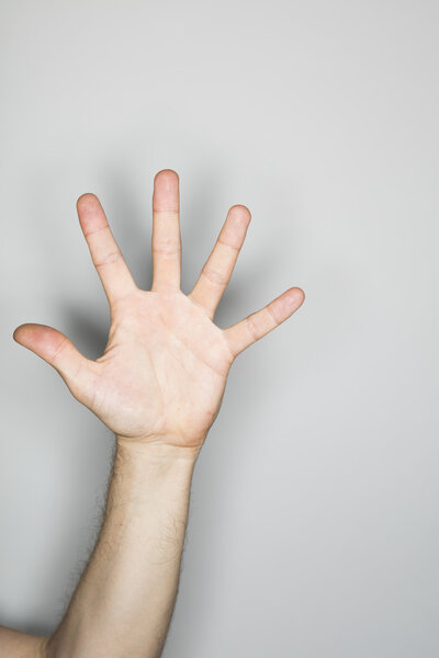 white male person doing an isolated hand gesture 