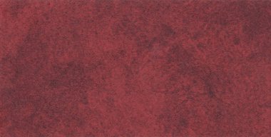 Yumuşak kadife gibi yüzeyi olan zengin, koyu kırmızı kabartmalı kağıt zarif ambalajlar, davetiyeler ve dekoratif tasarım projeleri için lüks bir arka plan sunuyor..