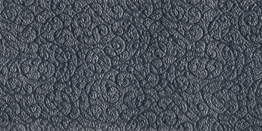 Zarif girdap motifleriyle kabartmalı koyu gri kağıt, lüks ambalajlar, davetiyeler ve markalaşma projeleri için sofistike bir arka plan sunuyor..