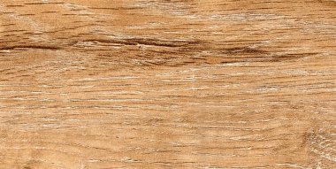 Açık meşe işlemeli kağıt, doğal ahşap desenli yumuşak ve sıcak dekoratif bir yüzey sunar..