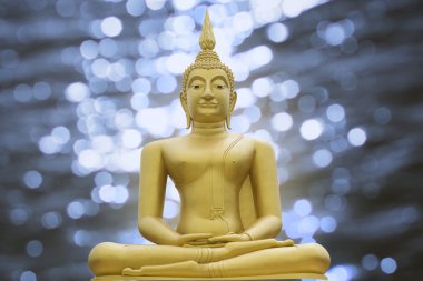 Buda altın görüntü bulanık ışık bokeh arka planda, filtre uygulanmış görüntü