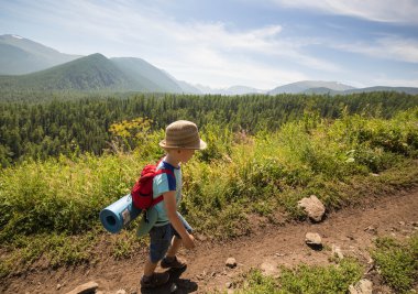 boy running by mountains track clipart