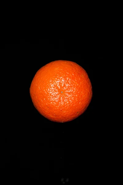 Solární oranžová na černém pozadí — Stock fotografie