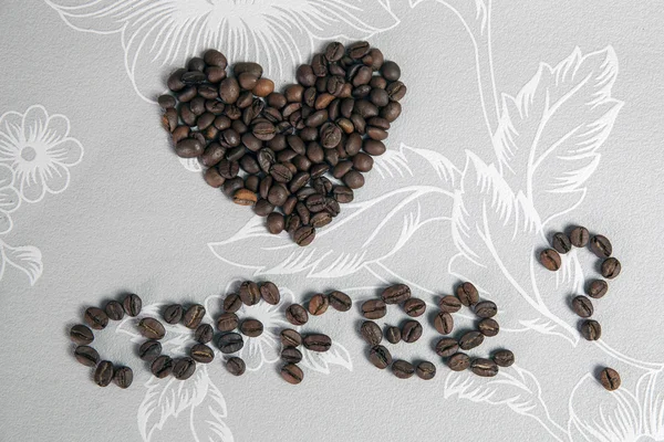 Inscription, faire du café ? Le cœur et l'inscription grains de café — Photo