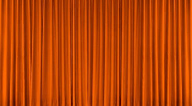 Long orange stage curtain for use as a background.