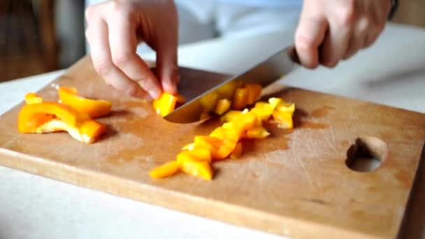 Woman Cut Dice Yellow Bell Pepper Wooden Cutting Board — Stock Video