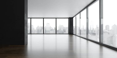 modern güneşli çatı katı ahşap zemin ve şehir manzaralı büyük pencereleri olan büyük ofis binası.