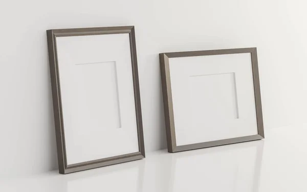 Molduras de madeira vazias em branco inclinando-se na parede branca 3d renderizar ilustração — Fotografia de Stock