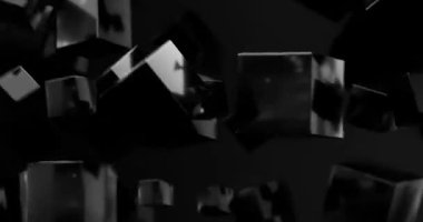 Karanlık bir uzayda yüzen soyut siyah küplerin tekrarlanması gizemli ve modern bir atmosfer yaratıyor..