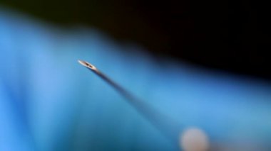 Makro fotoğrafçılık bir şırınga sıvı ile