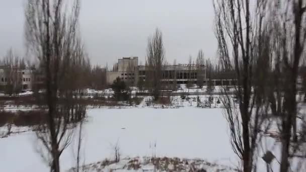 Pripyat. Parque de atracciones. Palacio de cultura Energetik. Aérea. invierno — Vídeos de Stock