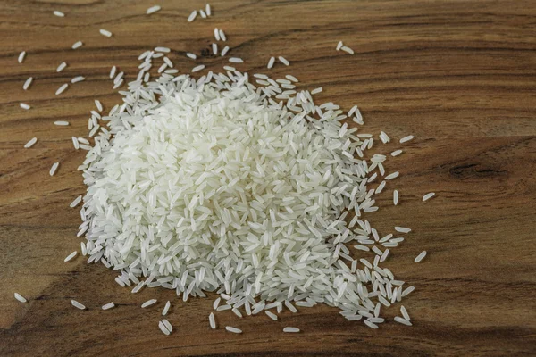 Spilled rice on the table — Stock Photo, Image