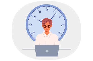 Dizüstü bilgisayarla çalışan erkek serbest çalışanların teslim tarihine yaklaşmak stres ve istifa etme arzusuna yol açıyor. Büyük saat son teslim tarihini hatırlatır ve odaklanmış ofis katibi veya yöneticisinin verimliliğini artırır..