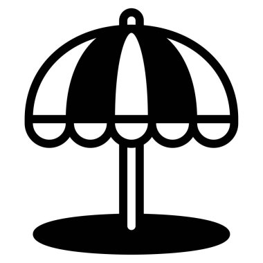 Siyah beyaz plaj Şemsiyesi kumlu zeminde duruyor