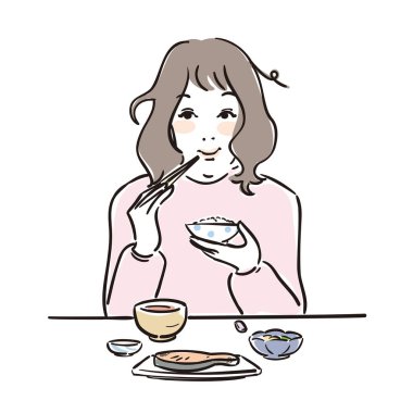 Kahvaltını yapan tatlı bir kadın.