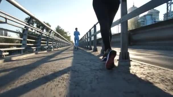 Sporty urban runners during outdoor workout — Stock Video