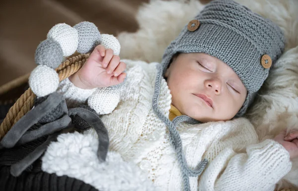 Portrait Sleeping Baby Warm Knitted Hat Knitted Toy Handle Blurred — Stock Photo, Image