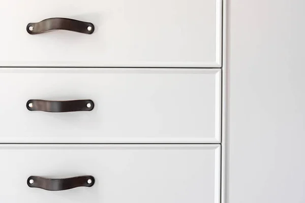 Close Minimalistic White Furniture Black Handles Kitchen Cabinet Details — Stock Photo, Image