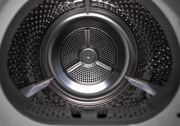 Washing dryer machine inside view of a drum.