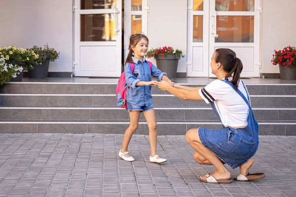 Mother Accompanies Student School Happy Little Girl Caring Mom Back — Stock Photo, Image