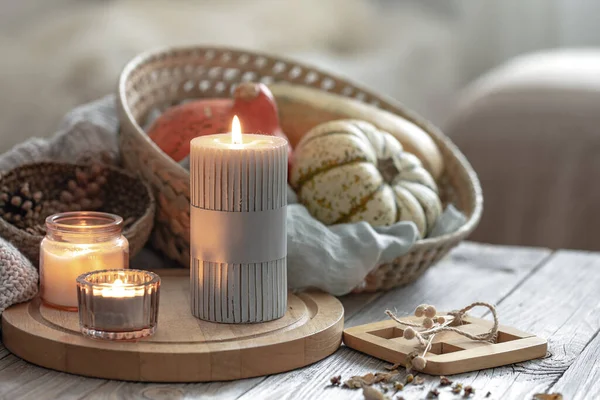 Cozy Autumnal Composition Burning Candles Pumpkins Blurred Background — Stock Photo, Image