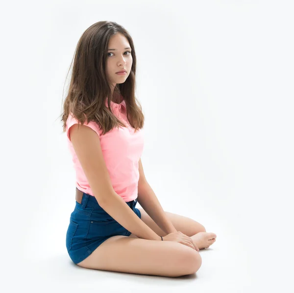 Portrait of a beautiful young brunette in the studio — Stock Photo, Image