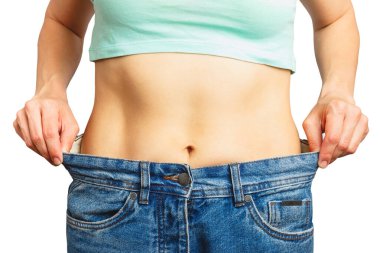 Sıska güzel kadın büyük beden kot pantolon giyiyor, diyet ve sağlık konsepti, izole edilmiş.