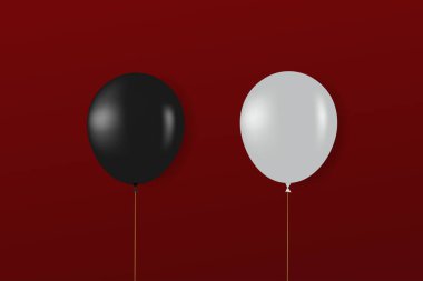 Kırmızı kurdeleli siyah balonlar