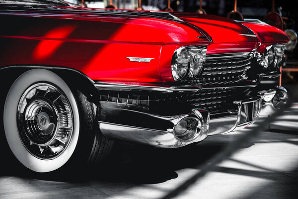 Novokuznetsk, Kemerovo Oblast / Russia - 2018: RetroPark, red cadillac Eldorado glitters in the sun