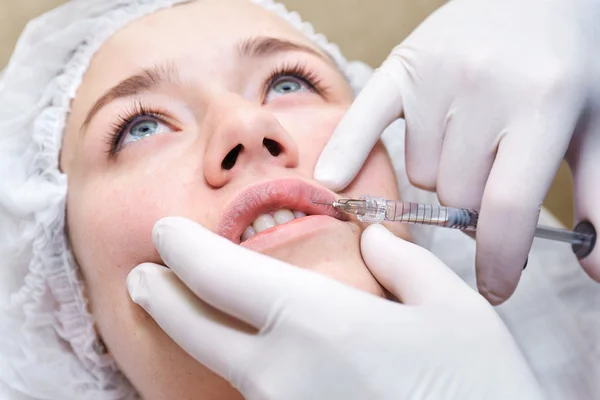 Procedure of lip injection with filler. — Stock Photo, Image