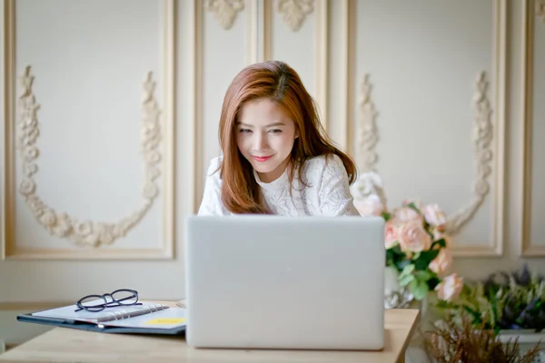 Woman  with laptop watching  drama movie