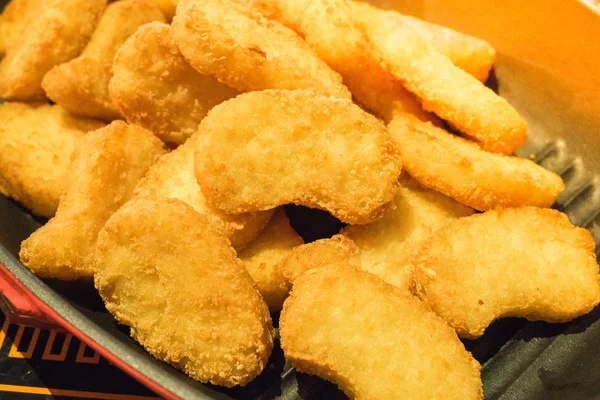 Chicken nuggets served in pan — Stock Fotó