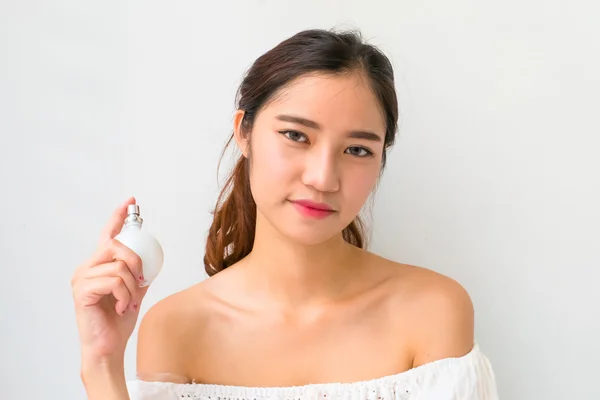 The Girl with perfume, young beautiful woman holding bottle of p — Stock Photo, Image