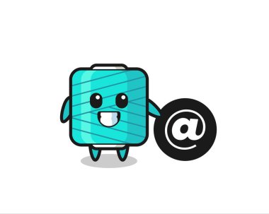 Sembolün yanında duran iplik makarasının çizgi film çizimi tişört, etiket, logo elementi için şirin bir tasarım.