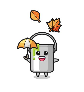 Sonbaharda şemsiye tutan şirin boya kutusu karikatürü, tişört, çıkartma, logo elementi için şirin bir tasarım.