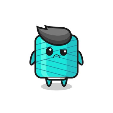 Tişört, etiket, logo elementi için şirin bir tasarım, şüpheli yüzlü iplik makarasının maskotu.