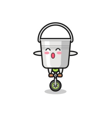 Şirin metal kova karakteri sirk bisikleti sürüyor. Tişört, çıkartma, logo elementi için şirin bir tasarım.