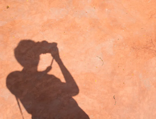 Fotograf cień na ziemię — Zdjęcie stockowe